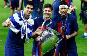Membres de la MSN en photo apès la victoire de la ligue des champions en 2015